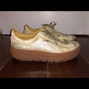 Gold Puma Sneakers